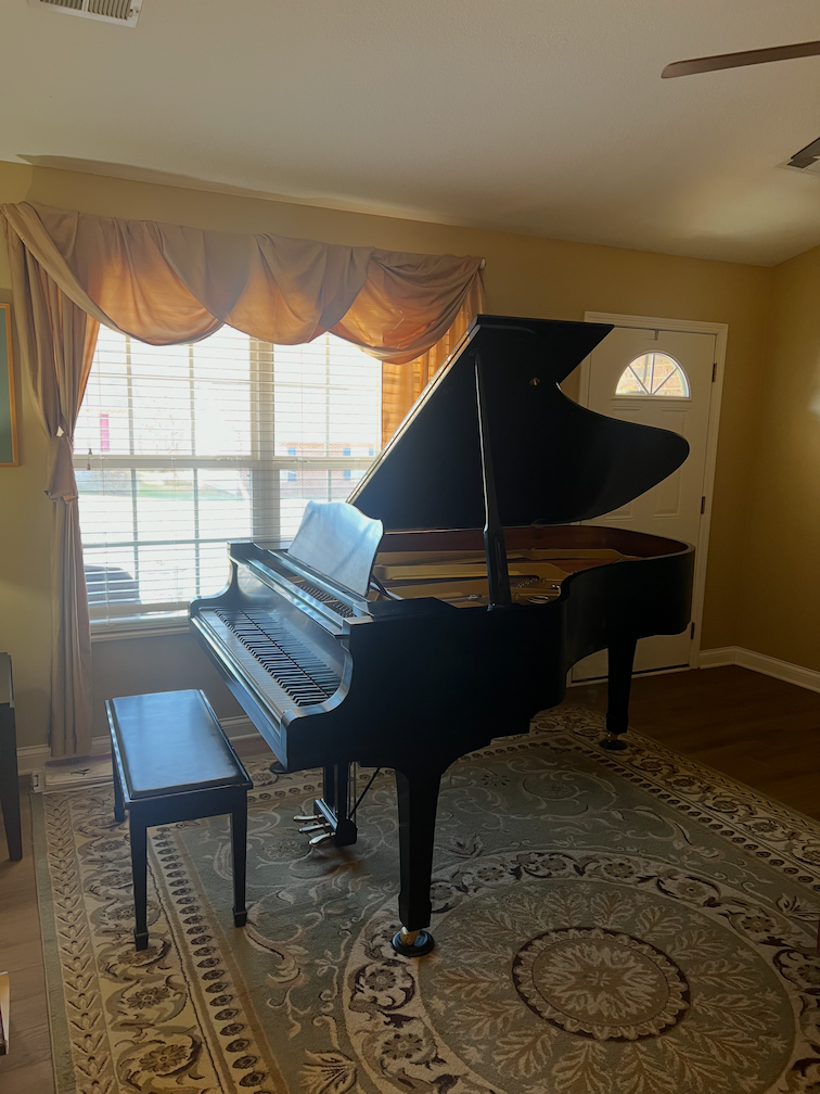 Ana Tipton teaching a piano lesson at Strawberry Fields Music Studio in Knoxville, TN